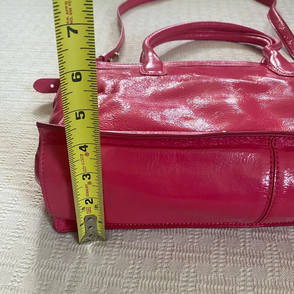 Cole Haan pink patent leather purse.